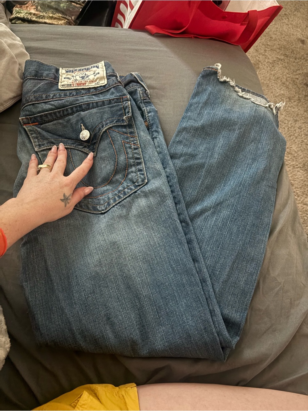 True Religion Men's Straight Jeans in Medium Blue with Distressed Hem